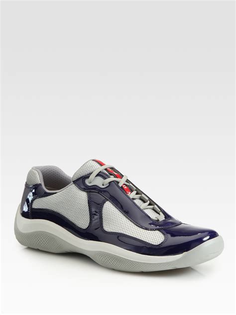 blue patent leather Prada sneakers